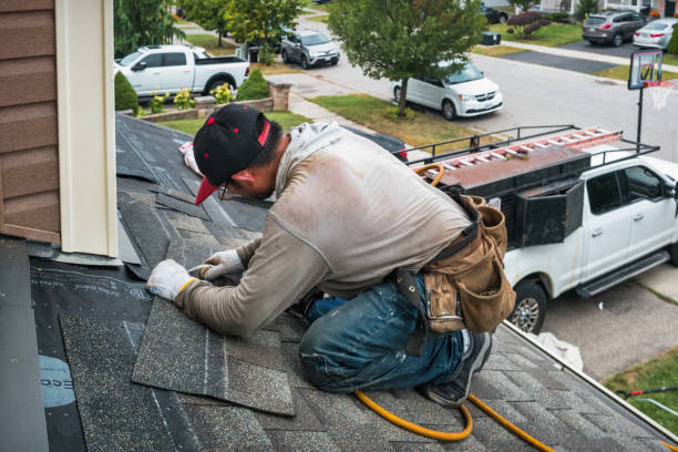 Professional Roofing technician working in Macomb, OK